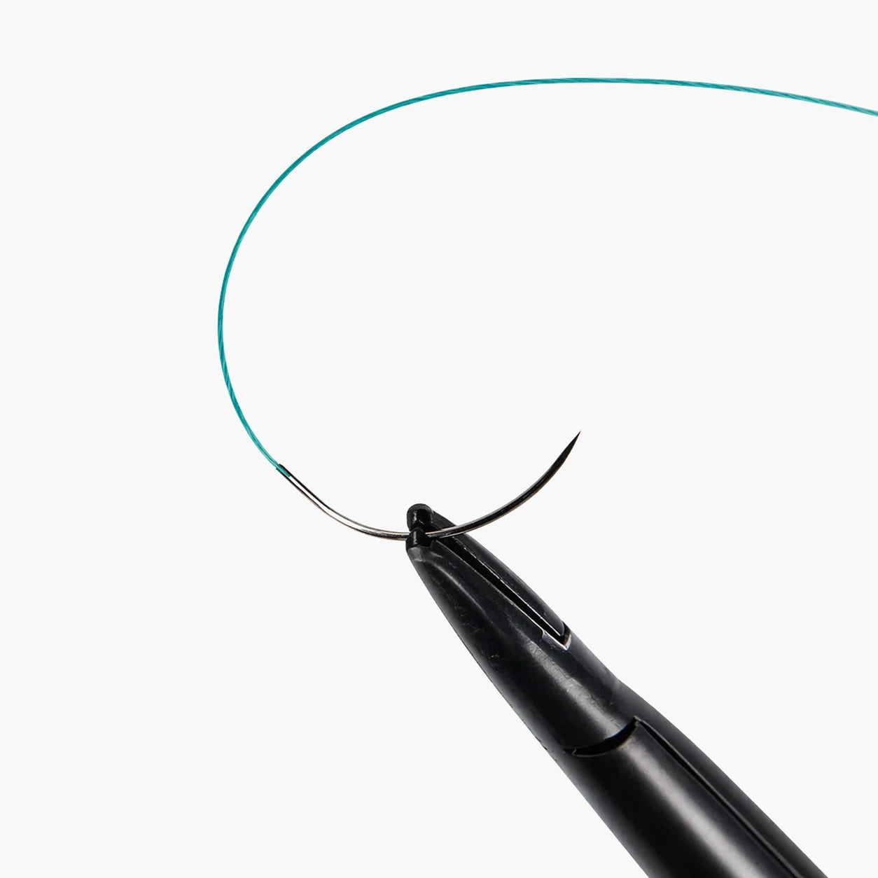 Close-up of 15 mm 3/8 circle Black Regular needle for Techsuture Nylon Soft Blue Suture USP 5-0
