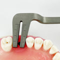 Power Self-Centering Implant Guide positioned between adjacent teeth for anterior implant pilot centering in 4-10 mm spaces