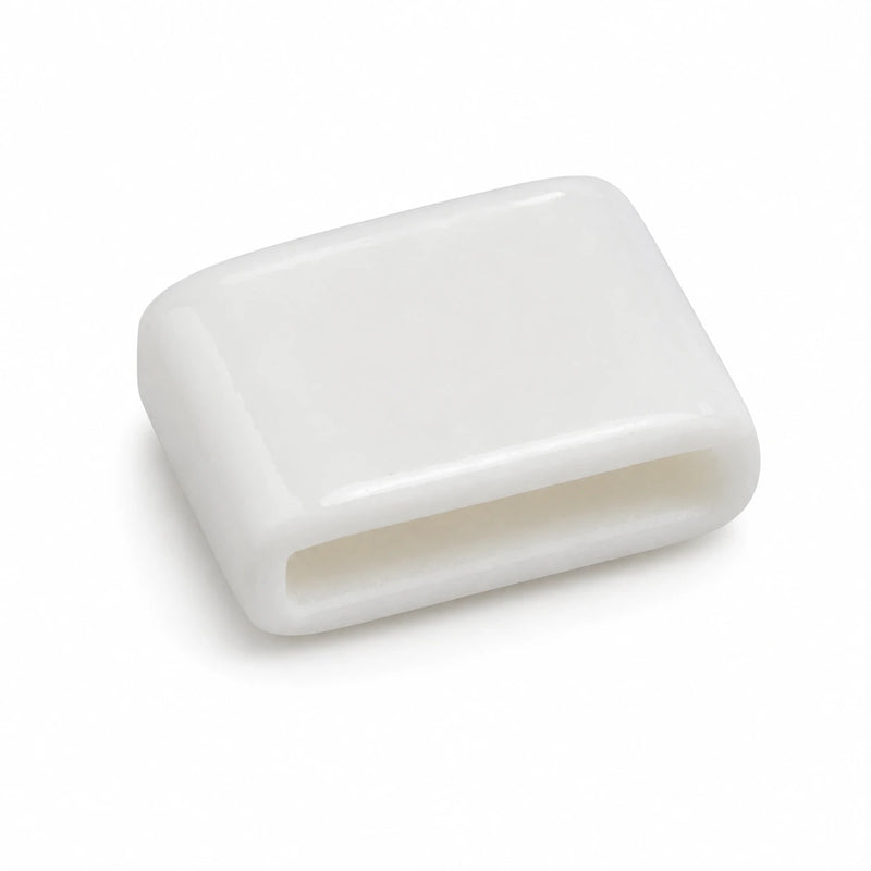 Close-up of thin white silicone replacement pad for Power Fulcrum forceps