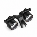 BiLumix BLUM-2 Standard 2.5× macroscopic dental loupe with dual optical barrels and mounting bracket on a white background