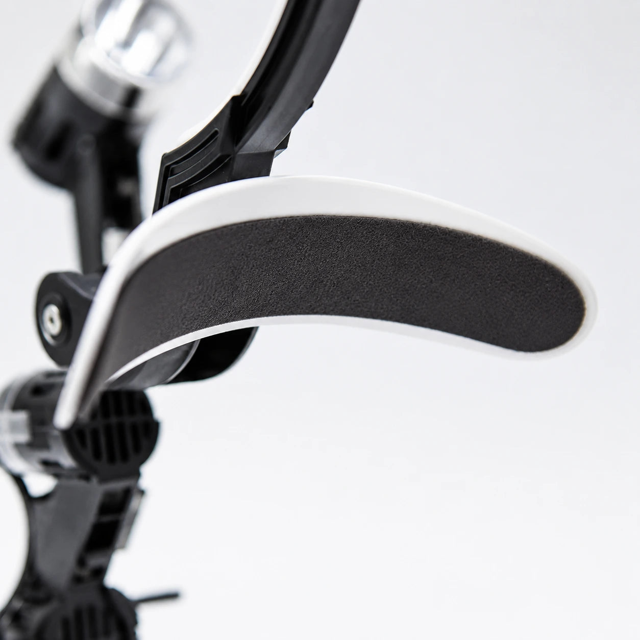 Close-up of the BiLumix forehead plate with removable forehead cushion attached