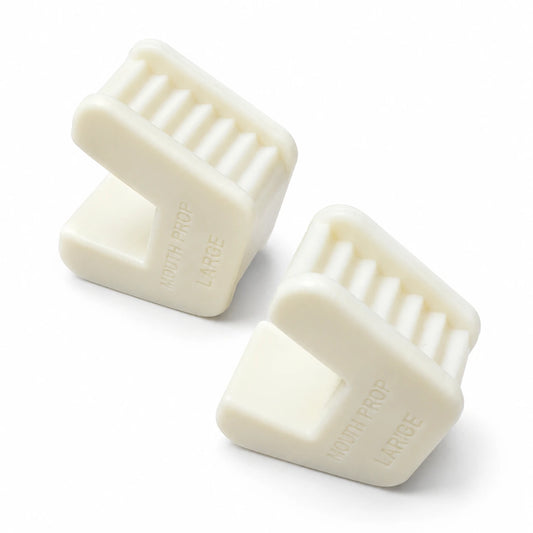 Dental bite blocks showing ribbed silicone inner bite surfaces for medium and large mouth props
