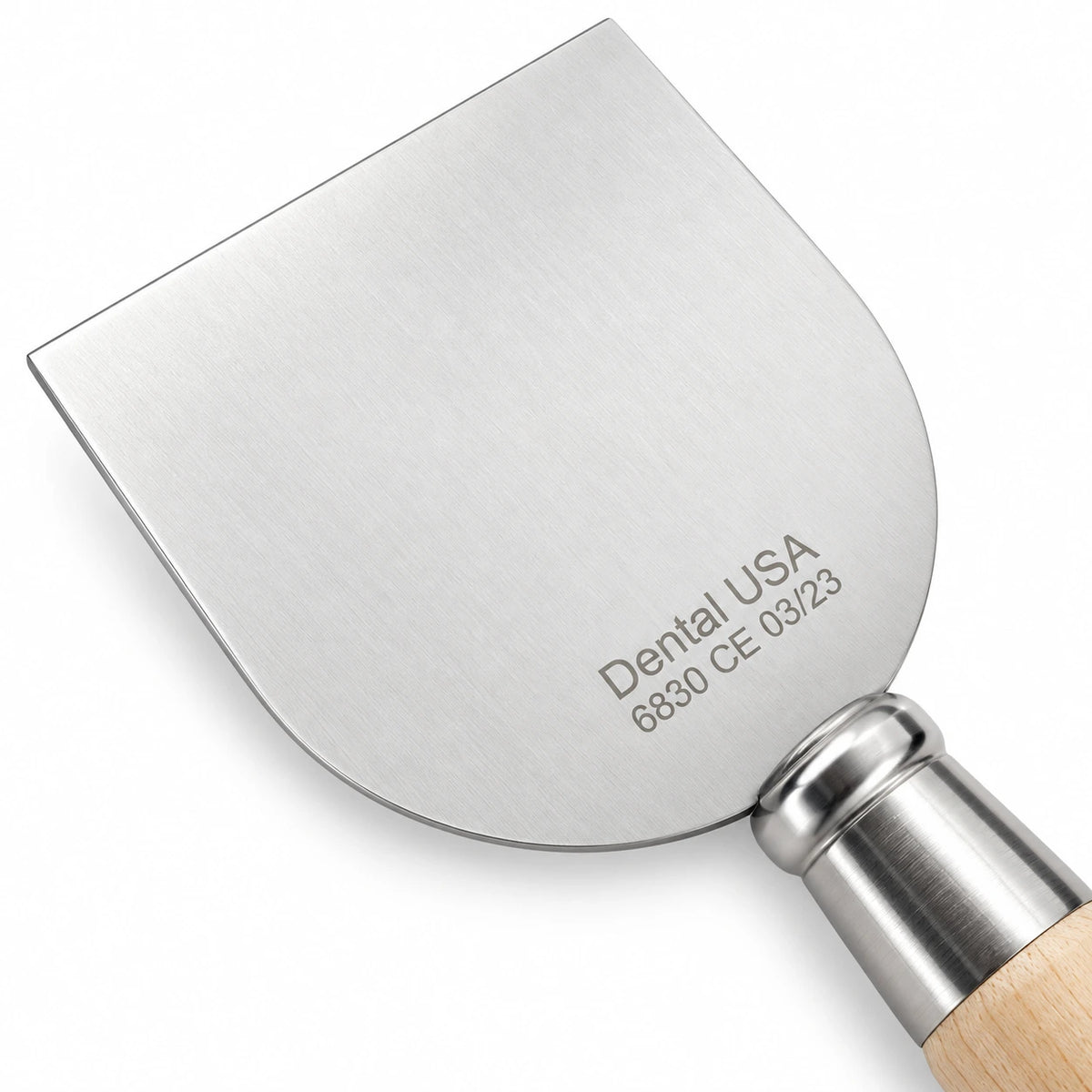 Close-up of Hot Plate Spatula 6830 showing the stainless steel plate, Dental USA engraving and metal ferrule